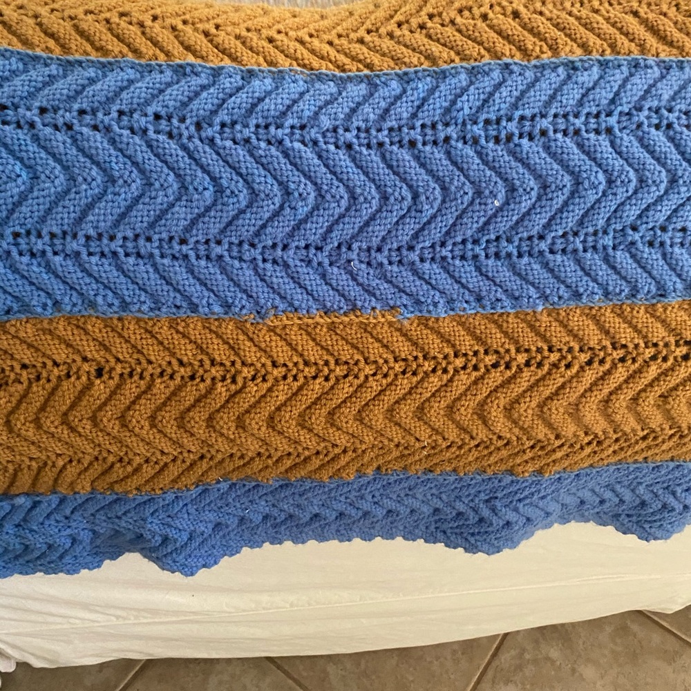 Handmade aphgan blue and brown pattern blanket.
